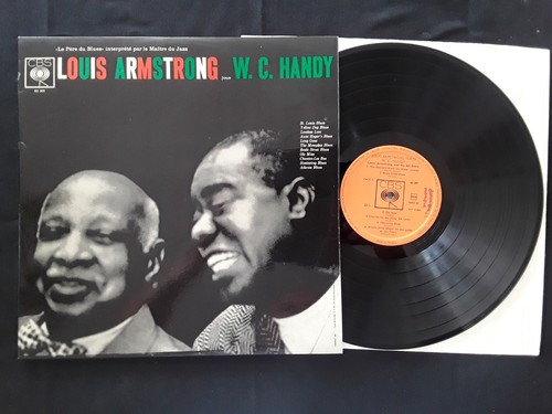 Louis armstrong joue w c - louis,